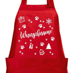 Rote Kochschürze mit Weihnachtsmotiv aus Pfoten, Geschenk, Tannenbaum und Wunschname in der Mitte