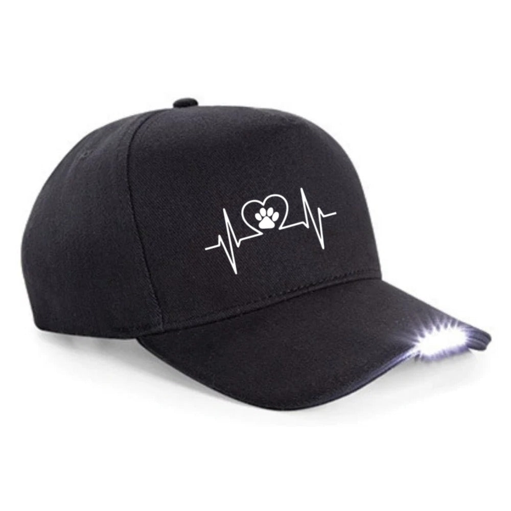 Schwarze LED-Basecap mit Herzschlag-Motiv