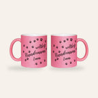 Rosa Glitzertasse mit dem Spruch Weltbeste Hundemama, Pfotenspuren und dem Namen Emma, Ansicht beider Seiten